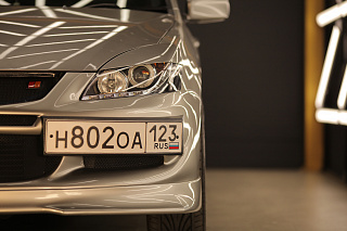 Крепление гос. номера в стиле EVO текстурный пластик Mitsubishi Lancer IX (2003-2009)